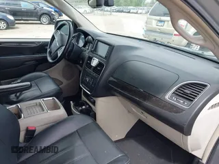 2014 Chrysler Town & Country Touring-L with VIN 2C4RC1CG2ER107917, listed as a IAAI auction lot 42180194 with 169,447 mi miles. Bid and sale history available at carsss.com. Image 5.