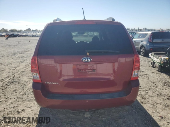 2012 Kia Sedona LX with VIN KNDMG4C79C6483194, listed as a Copart auction lot 77485374 with 110,831 mi miles and Salvage Title. Bid and sale history available at carsss.com. Image 6.
