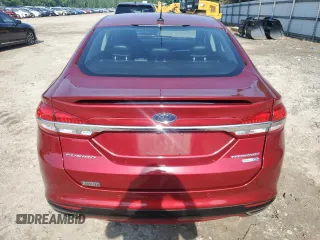 2017 Ford Fusion Titanium с VIN 3FA6P0D96HR208223, выставлен на аукционе Copart как лот 57019565 с пробегом 73 211 миль миль и Списание • Salvage title. История ставок и продаж доступна на DreamBid. Изображение 6.