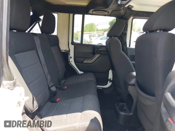 2012 Jeep Wrangler Unlimited Sport with VIN 1C4BJWDG7CL273102, listed as a IAAI auction lot 42288975 with 155,153 mi miles and . Bid and sale history available at DreamBid. Image 8.