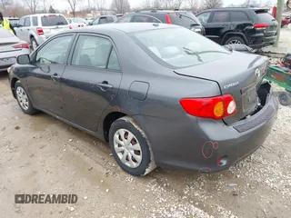 2009 Toyota Corolla with VIN 1NXBU40E99Z138136, listed as a IAAI auction lot 41967052 with 207,892 mi miles. Bid and sale history available at carsss.com. Image 3.