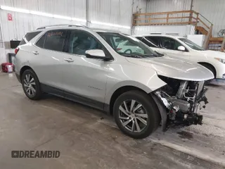 2022 Chevrolet Equinox Premier z VIN 2GNAXXEV8N6155415, wystawiony jako IAAI lot #40704658 z przebiegiem 33 182 mil mil oraz . Historia ofert i sprzedaży dostępna na DreamBid. Obrazek 1.