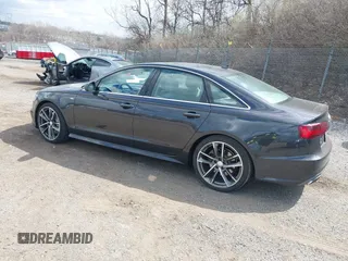 2016 Audi A6 2.0T Premium Plus with VIN WAUGFAFC7GN095669, listed as a IAAI auction lot 41894313 with 84,725 mi miles. Bid and sale history available at carsss.com. Image 3.
