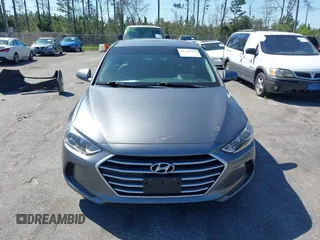 2018 Hyundai Elantra SEL z VIN 5NPD84LF5JH336295, wystawiony jako IAAI lot #41786963 z przebiegiem 96 399 mil mil oraz . Historia ofert i sprzedaży dostępna na DreamBid. Obrazek 12.