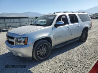 2013 Chevrolet Suburban LT with VIN 1GNSCJE05DR371789, listed as a Copart auction lot 60755775 with 233,275 mi miles and Salvage title. Bid and sale history available at DreamBid. Image 1.
