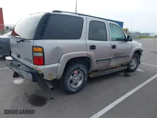 2004 Chevrolet Tahoe Special Service Veh with VIN 1GNEK13V14J221157, listed as a IAAI auction lot 41932600 with 205,296 mi miles. Bid and sale history available at carsss.com. Image 4.