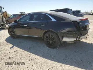 2016 Cadillac XTS Luxury Collection with VIN 2G61N5S37G9197536, listed as a Copart auction lot 52705785 with 143,434 mi miles and Salvage title. Bid and sale history available at DreamBid. Image 2.
