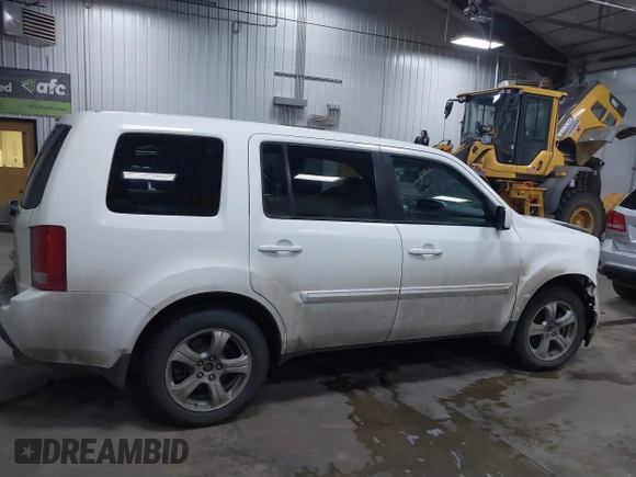 2015 Honda Pilot EX-L with VIN 5FNYF4H59FB023814, listed as a IAAI auction lot 41161235 with 216,437 mi miles and . Bid and sale history available at carsss.com. Image 13.