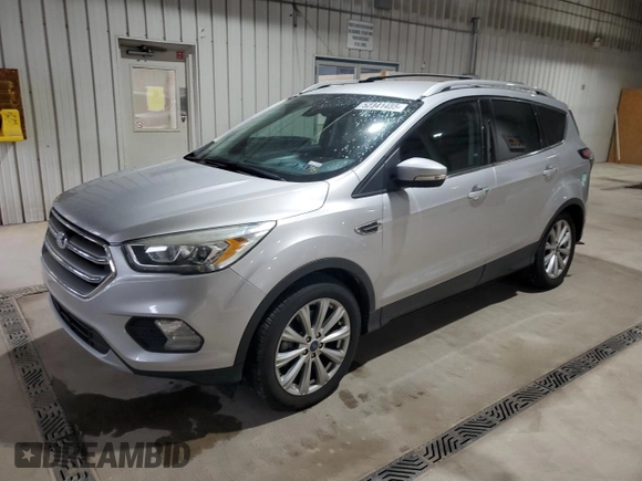 2017 Ford Escape Titanium with VIN 1FMCU9JD9HUC58945, listed as a Copart auction lot 52341485 with 31,074 mi miles and Salvage Title. Bid and sale history available at carsss.com. Image 1.