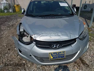 2013 Hyundai Elantra Limited with VIN 5NPDH4AE9DH152427, listed as a IAAI auction lot 40043156 with 130,024 mi miles and . Bid and sale history available at DreamBid. Image 6.