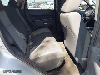 2010 Jeep Grand Cherokee Laredo with VIN 1J4PS4GK3AC163307, listed as a IAAI auction lot 41681527 with 155,464 mi miles. Bid and sale history available at carsss.com. Image 8.
