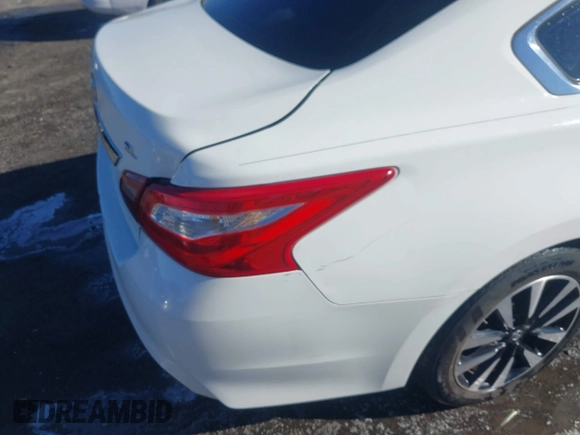 2018 Nissan Altima S with VIN 1N4AL3AP9JC181033, listed as a IAAI auction lot 41400570 with 198,928 mi miles and . Bid and sale history available at carsss.com. Image 21.