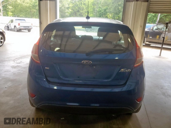 2019 Ford Fiesta SE z VIN 3FADP4EJ4KM142797, wystawiony jako Copart lot #56876095 z przebiegiem 82 545 mil mil oraz Szkoda całkowita • Salvage title. Historia ofert i sprzedaży dostępna na DreamBid. Obrazek 6.