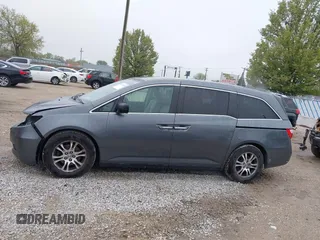2013 Honda Odyssey EX z VIN 5FNRL5H47DB032096, wystawiony jako IAAI lot #42149190 z przebiegiem 149 836 mil mil oraz . Historia ofert i sprzedaży dostępna na DreamBid. Obrazek 14.