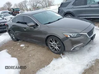2016 Mazda Mazda6 i Grand Touring with VIN JM1GJ1W51G1415241, listed as a IAAI auction lot 41729071 with 114,214 mi miles. Bid and sale history available at carsss.com. Image 1.