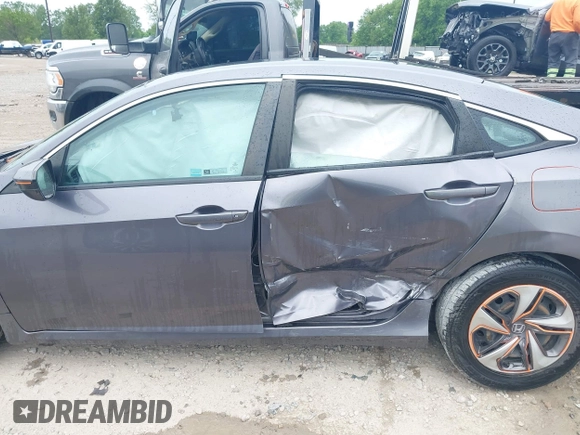 2020 Honda Civic LX z VIN 19XFC2F66LE012481, wystawiony jako IAAI lot #42297600 z przebiegiem 56 602 mil mil oraz . Historia ofert i sprzedaży dostępna na DreamBid. Obrazek 15.