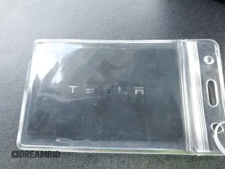 2018 Tesla Model 3 Long Range Battery with VIN 5YJ3E1EA2JF023370, listed as a IAAI auction lot 42008406 with 163,474 mi miles and . Bid and sale history available at DreamBid. Image 11.