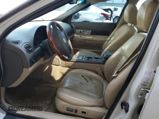 2005 Lincoln LS Sport z VIN 1LNHM87A05Y646745, wystawiony jako Copart lot #70427194 z przebiegiem Nie podano mil oraz Szkoda całkowita • Salvage title. Historia ofert i sprzedaży dostępna na DreamBid. Obrazek 7.