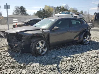 2014 Dodge Avenger SE z VIN 1C3CDZAB9EN200864, wystawiony jako Copart lot #50874185 z przebiegiem 147 023 mil mil oraz Szkody całkowita. Historia ofert i sprzedaży dostępna na DreamBid. Obrazek 1.