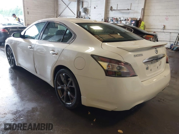 2013 Nissan Maxima SV with VIN 1N4AA5AP6DC804257, listed as a IAAI auction lot 42264222 with 206,818 mi miles and . Bid and sale history available at DreamBid. Image 3.