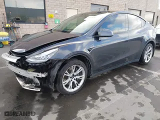 2021 Tesla Model Y Long Range with VIN 5YJYGDEE5MF240579, listed as a IAAI auction lot 41626674 with 98,384 mi miles. Bid and sale history available at carsss.com. Image 20.