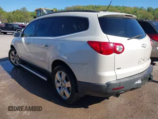2011 Chevrolet Traverse LTZ with VIN 1GNKVLED9BJ158896, listed as a IAAI auction lot 42023356 with 203,809 mi miles and . Bid and sale history available at DreamBid. Image 3.