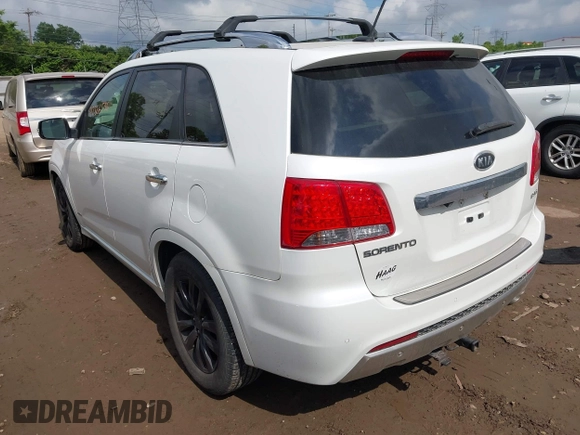 2012 Kia Sorento SX z VIN 5XYKWDA23CG231228, wystawiony jako IAAI lot #42366536 z przebiegiem 154 627 mil mil oraz . Historia ofert i sprzedaży dostępna na DreamBid. Obrazek 3.