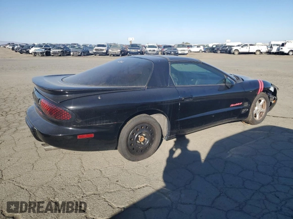 1999 Pontiac Firebird Firebird z VIN 2G2FS22K6X2208489, wystawiony jako Copart lot #79930994 z przebiegiem 181 964 mil mil oraz Czysty tytuł • Clean title. Historia ofert i sprzedaży dostępna na DreamBid. Obrazek 3.