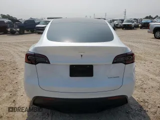 2024 Tesla Model Y Long Range с VIN 7SAYGDEE5RA261374, выставлен на аукционе Copart как лот 57666185 с пробегом 30 174 миль миль и Списание • Salvage title. История ставок и продаж доступна на DreamBid. Изображение 6.