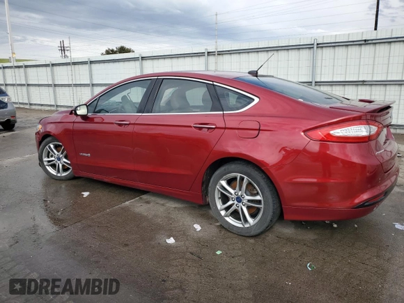 2015 Ford Fusion Titanium Hybrid with VIN 3FA6P0RUXFR247357, listed as a Copart auction lot 55943975 with 112,278 mi miles and Salvage title. Bid and sale history available at DreamBid. Image 2.