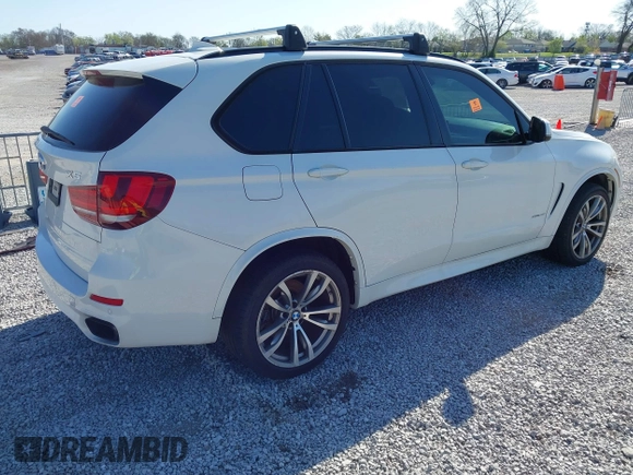 2015 BMW X5 xDrive50i with VIN 5UXKR6C5XF0J76697, listed as a IAAI auction lot 41953074 with 141,377 mi miles and . Bid and sale history available at DreamBid. Image 4.