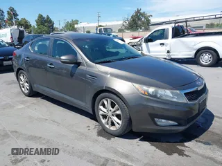 2012 Kia Optima EX z VIN 5XXGN4A79CG069890, wystawiony jako IAAI lot #42383046 z przebiegiem 185 196 mil mil oraz . Historia ofert i sprzedaży dostępna na DreamBid. Obrazek 1.