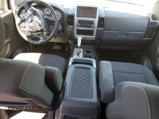 2015 Nissan Titan Pro-4X z VIN 1N6AA0EC9FN512658, wystawiony jako Copart lot #68066964 z przebiegiem 131 026 mil mil oraz Szkoda całkowita • Salvage title. Historia ofert i sprzedaży dostępna na DreamBid. Obrazek 8.