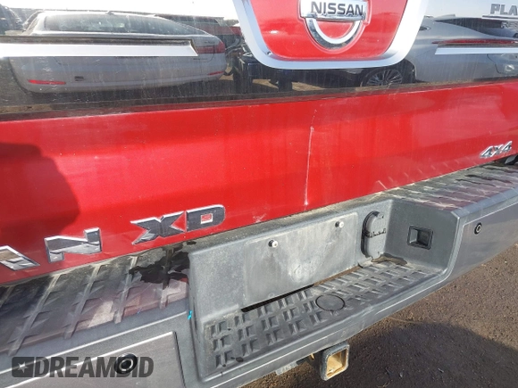 2017 Nissan Titan Pro-4X z VIN 1N6BA1F43HN562377, wystawiony jako IAAI lot #41786607 z przebiegiem 95 207 mil mil oraz . Historia ofert i sprzedaży dostępna na DreamBid. Obrazek 6.
