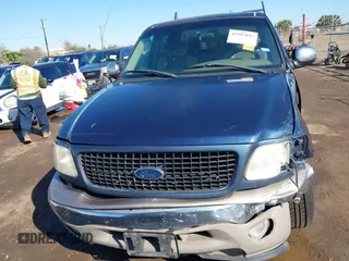 2002 Ford F-150 XLT with VIN 1FTRW07692KC25069, listed as a IAAI auction lot 41387047 with 208,811 mi miles. Bid and sale history available at carsss.com. Image 12.