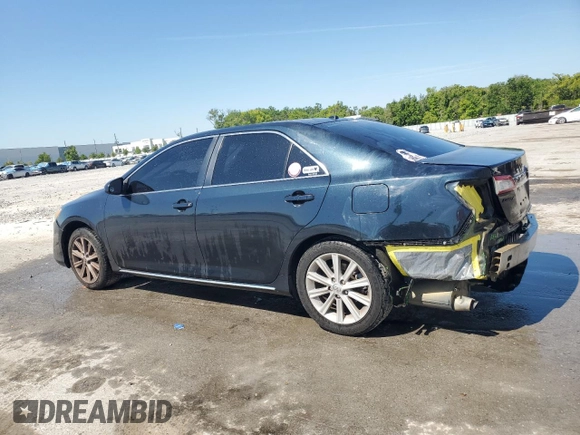 2014 Toyota Camry SE with VIN 4T1BK1FK0EU025526, listed as a Copart auction lot 50795485 with 236,054 mi miles and Salvage Title. Bid and sale history available at carsss.com. Image 2.