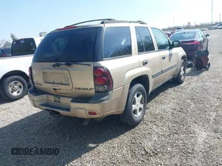 2004 Chevrolet TrailBlazer LT with VIN 1GNDS13S142422830, listed as a IAAI auction lot 42054144 with 218,042 mi miles and . Bid and sale history available at DreamBid. Image 4.