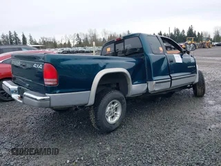 1997 Dodge Dakota z VIN 1B7GG23X9VS242604, wystawiony jako IAAI lot #41772203 z przebiegiem Nie podano mil oraz . Historia ofert i sprzedaży dostępna na DreamBid. Obrazek 4.