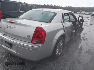 2010 Chrysler 300 C Hemi with VIN 2C3CA6CT5AH141439, listed as a IAAI auction lot 40797974 with 213,843 mi miles and . Bid and sale history available at carsss.com. Image 4.