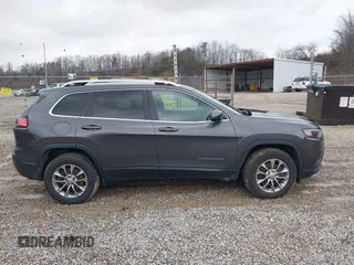 2019 Jeep Cherokee Latitude Plus with VIN 1C4PJMLB0KD191740, listed as a IAAI auction lot 41585682 with 91,755 mi miles. Bid and sale history available at carsss.com. Image 12.