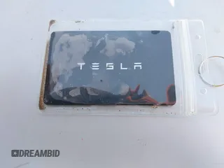 2023 Tesla Model 3 with VIN 5YJ3E1EA8PF398110, listed as a IAAI auction lot 41692006 with 112,699 mi miles and . Bid and sale history available at carsss.com. Image 11.