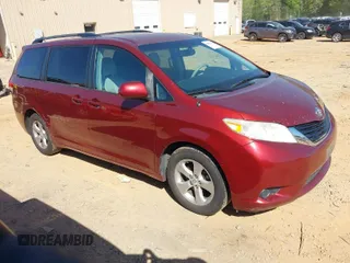 2011 Toyota Sienna LE AAS with VIN 5TDKK3DC5BS002349, listed as a IAAI auction lot 42058258 with 284,140 mi miles. Bid and sale history available at carsss.com. Image 1.