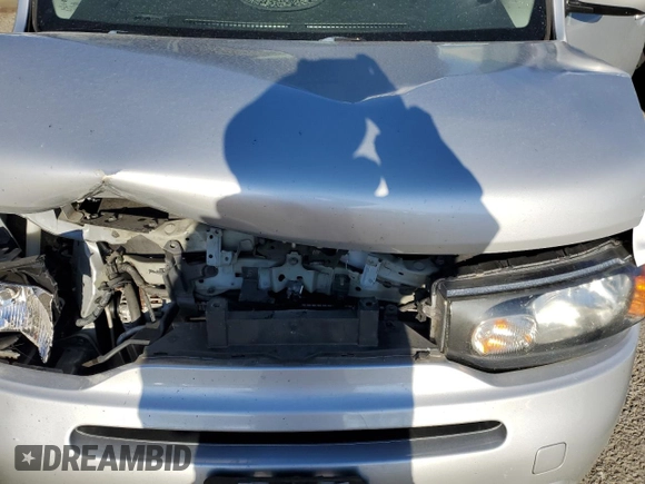 2012 Nissan Cube S z VIN JN8AZ2KR4CT250639, wystawiony jako Copart lot #82915424 z przebiegiem 70 650 mil mil oraz Szkody całkowita. Historia ofert i sprzedaży dostępna na DreamBid. Obrazek 14.