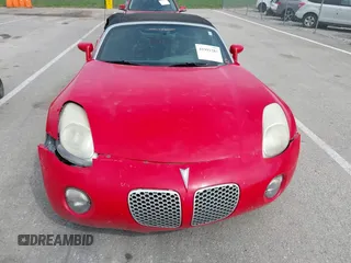 2007 Pontiac Solstice z VIN 1G2MB35B07Y112451, wystawiony jako IAAI lot #41991283 z przebiegiem 163 216 mil mil oraz . Historia ofert i sprzedaży dostępna na DreamBid. Obrazek 6.