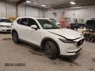 2018 Mazda CX-5 S Premium with VIN JM3KFBDM1J1412088, listed as a IAAI auction lot 41497431 with 65,532 mi miles and . Bid and sale history available at DreamBid. Image 1.