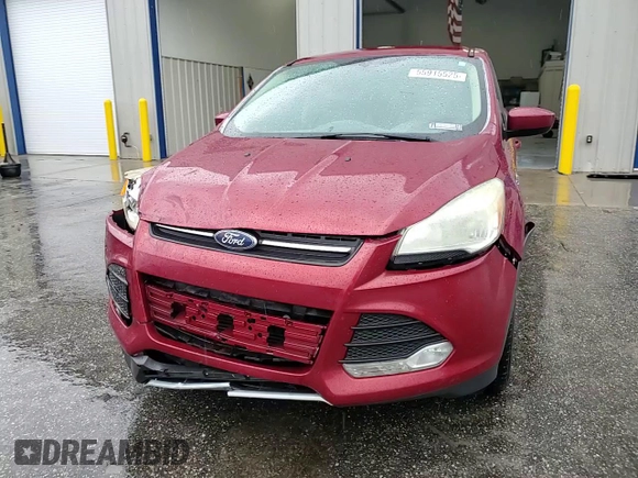 2013 Ford Escape SE z VIN 1FMCU0GX0DUD63803, wystawiony jako Copart lot #55915525 z przebiegiem 138 742 mil mil oraz Szkoda całkowita • Salvage title. Historia ofert i sprzedaży dostępna na DreamBid. Obrazek 14.