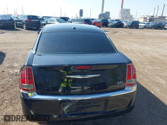 2014 Chrysler 300 C with VIN 2C3CCAKG5EH179583, listed as a IAAI auction lot 42001109 with 148,288 mi miles and . Bid and sale history available at carsss.com. Image 16.
