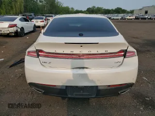 2014 Lincoln MKZ Hybrid z VIN 3LN6L2LU5ER823084, wystawiony jako Copart lot #59597565 z przebiegiem 126 402 mil mil oraz Szkoda całkowita • Salvage title. Historia ofert i sprzedaży dostępna na DreamBid. Obrazek 6.