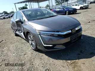 2018 Honda Clarity Touring z VIN JHMZC5F36JC014495, wystawiony jako Copart lot #56139675 z przebiegiem 75 020 mil mil oraz Szkoda całkowita • Salvage title. Historia ofert i sprzedaży dostępna na DreamBid. Obrazek 13.