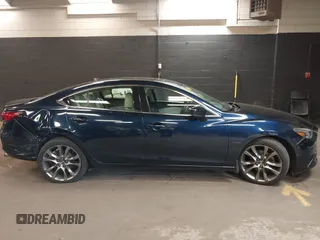 2017 Mazda 6 Grand Touring with VIN JM1GL1W51H1101519, listed as a IAAI auction lot 42132215 with 145,796 mi miles. Bid and sale history available at carsss.com. Image 13.